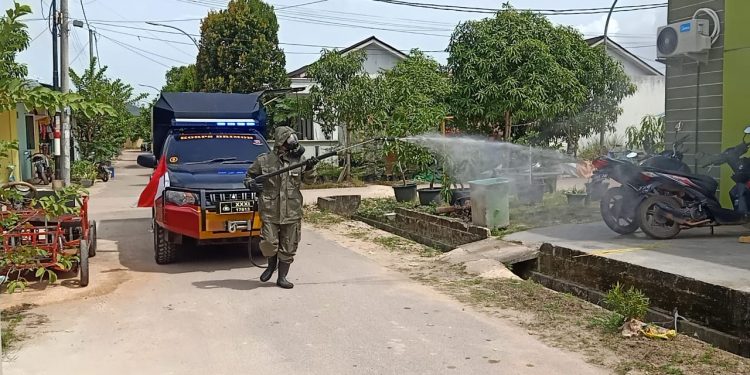 Tangkal Covid-19, Satbrimob Polda Kepri Kembali Semprot Desinfektan di Batam, Karimun dan Bintan
