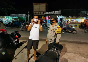 Bhabinkamtibmas Polsek Bontang Selatan Berikan Himbauan Prokes