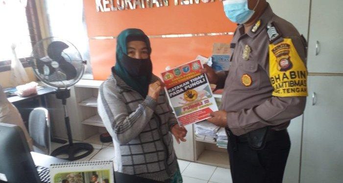 Bhabinkamtibmas Bripka Heru Triyanto Sampaikan Imbauan Saber Pungli kepada Warga