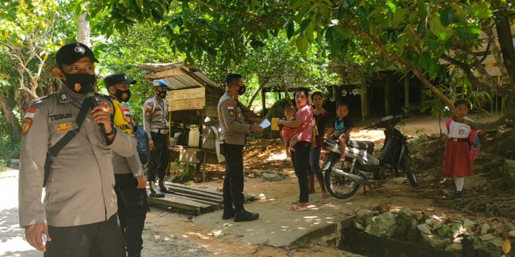 Polsek Bunguran Timur Himbau Pentingnya Protokol Kesehatan dan Vaksinasi Kepada Masyarakat