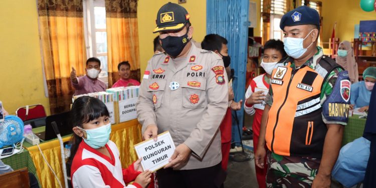 Polres Natuna Bersama TNI dan Pemerintah Daerah Laksanakan Vaksinasi Covid-19 Anak Usia 6-11 Tahun di Kabupaten Natuna